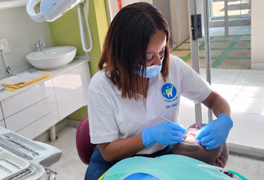 Dentist providing emergency dental care