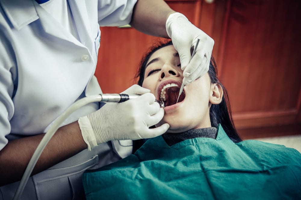 Dentist consulting with a patient during a general dentistry appointment